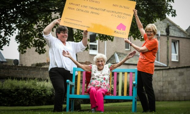 Montrose 90-year-old Cathleen Paton with neice Cara Taylor and and Maggie's volunteer Margaret McKay at the cheque handover. Pic: Mhairi Edwards/DCT Media.