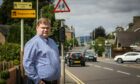 Councillor Daniel Coleman has raised the issue of safety fears if lollipop crossings at Downfield Primary are removed. Pic: Mhairi Edwards/DCT Media