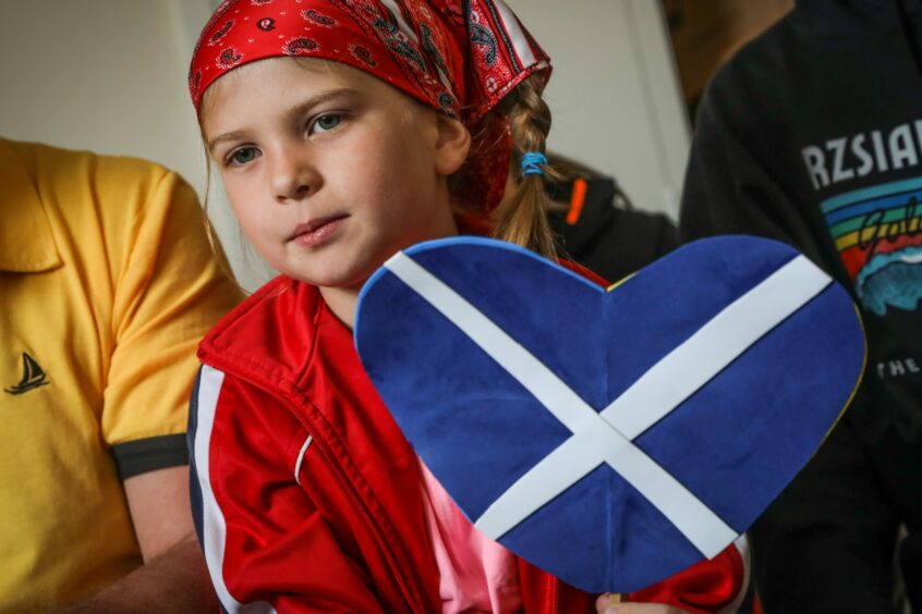Daria Kartavtseva with a Scotland heart-shaped flag