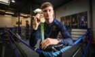 Sam hickey with his Commonwealth Games gold medal.