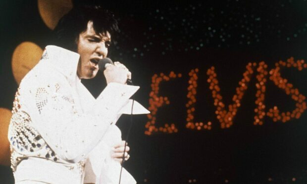 Mandatory Credit: Photo by Uncredited/AP/Shutterstock (11532864a)
Elvis Presley, the King of Rock 'n' Roll, during a performance. At one of three concerts at the Monroe Civic Center in 1974, Elvis Presley gave one of his necklaces to a local 5-year-old. A documentary from Elvis historian and fan Bud Glass traces how the King of Rock 'N Roll traces the history of the piece
Exchange-Elvis Memorabilia - 01 Jan 1972
