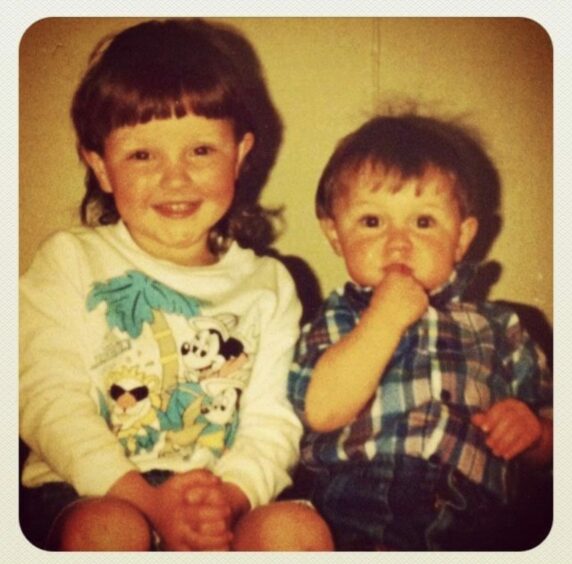 Lynne Hoggan as a little girl with her baby brother