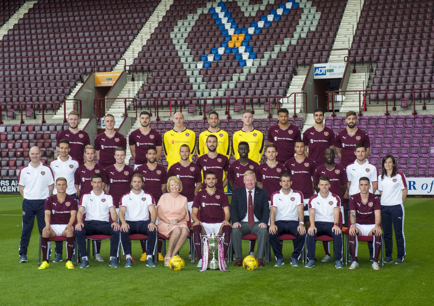 Stevie Crawford (front, fourth from right) pictured as part of the Hearts set up in 2015. Liam Fox is in the middle row, second right. Also pictured are former United managers Jack Ross and Robbie Neilson.