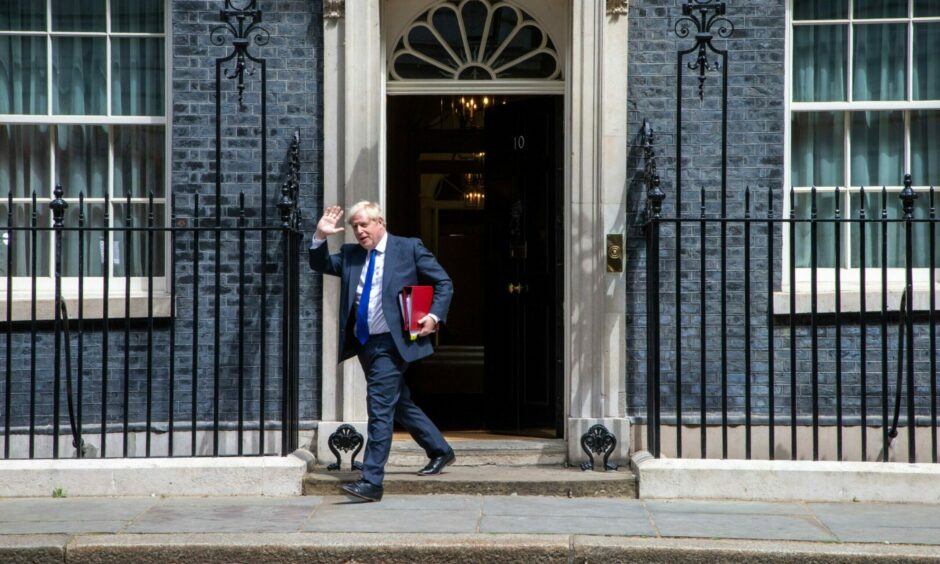 Boris Johnson leaving Downing Street.