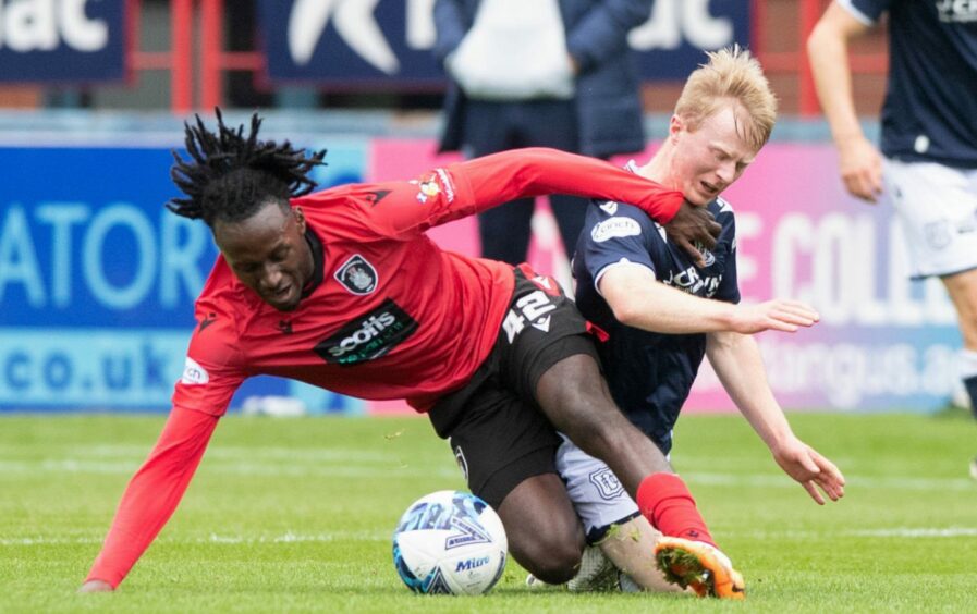 Malachi Boateng in action for Queen's Park against Dundee's Lyall Cameron. Image: SNS