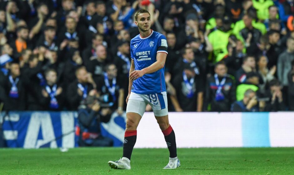 Rangers star James Sands takes the long walk against Napoli.