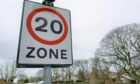 A 20mph zone sign.