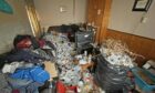 Rubbish filled fife house