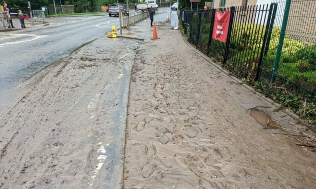 Mud left on Glenearn Road in Perth following the flooding.