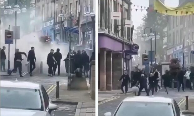 A major disturbance in Dunfermline as fans clash.