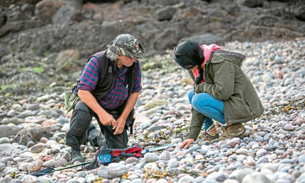 Gayle and Scottish Geology Trist volunteer John Taylor hunt for agates at Elephant Rock near Boddin Point, Montrose. Picture: Kim Cessford.