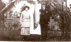Georgina Ballantine and her father in October 1922 with her record-breaking 64lb salmon.