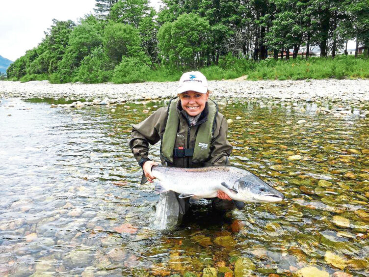 Anne with a huge salmon caught on the Tay.