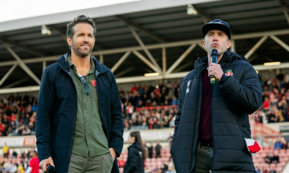 Ryan Reynolds and Rob McElhenney address the Wrexham fans.