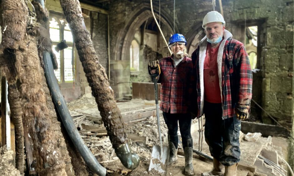 Tracey and Rob at work on the dilapidated castle.