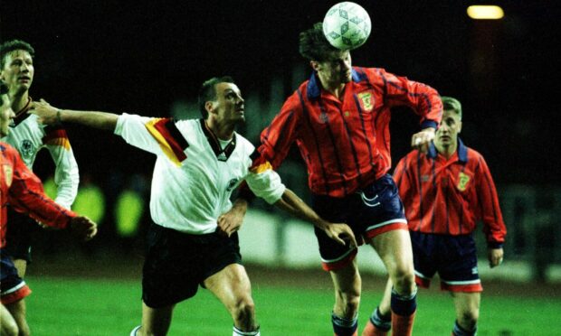 Duncan Ferguson beats Jürgen Kohler in the 1993 friendly game against Germany.