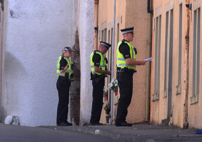 Police knock on doors in West Wemyss.