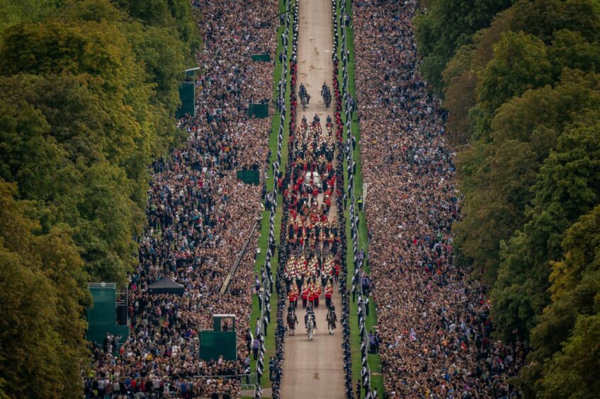 aerial shot showing huge crowds in London watching the Queen's funeral procession