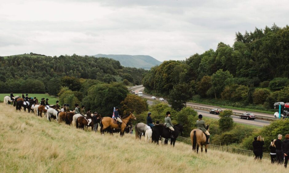 The horse guard as the royal cortege passed by on the M90 near Glenfarg