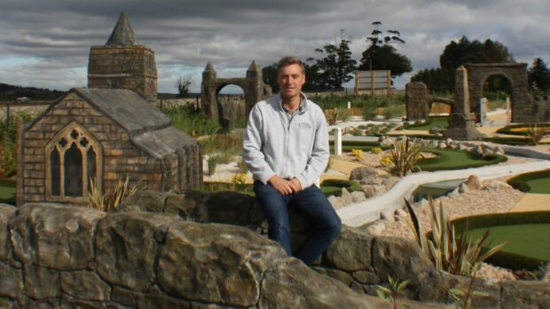 Andrew Kennedy at the adventure golf course at Clayton Caravan Park.