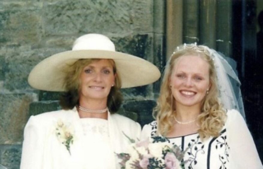 Lindsay, with her mum by her side, at her wedding in 2002.
