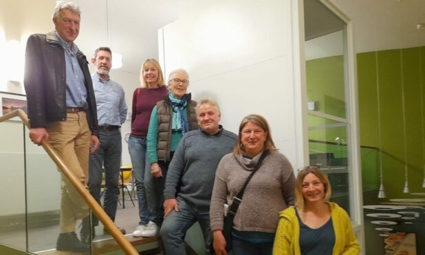 PKC Cllr Mike Williamson, Joe Gribben from Communities Housing Trust and interim directors of Aberfeldy Development Trust Sally Murray, Mary McDougall, Adam Hobson, Gill Steele and Carol Laing. ADT member not pictured: Graham Forsyth.