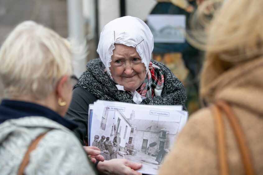 Violet Thomson enthralled visitors with tales of village life.