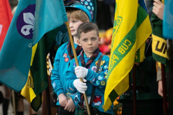 A young flag bearer at the Carnoustie ceremony. Pic: Kim Cessford/DCT Media.