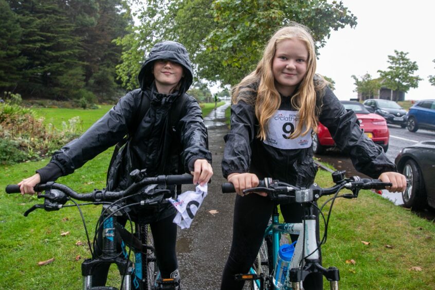 Maggie McGraw, 11, and Lauren Fox, 12, ready to head off on their cycle.