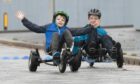 Youngsters take part in the Dundee Cyclathon on alternative cycles.
