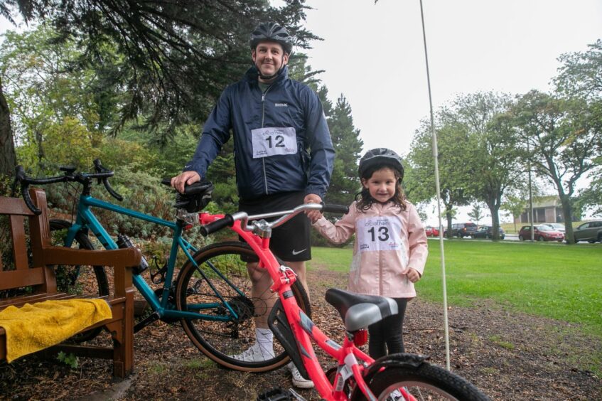 Mark and Penny, 5, Robinson used their tandem for the event.