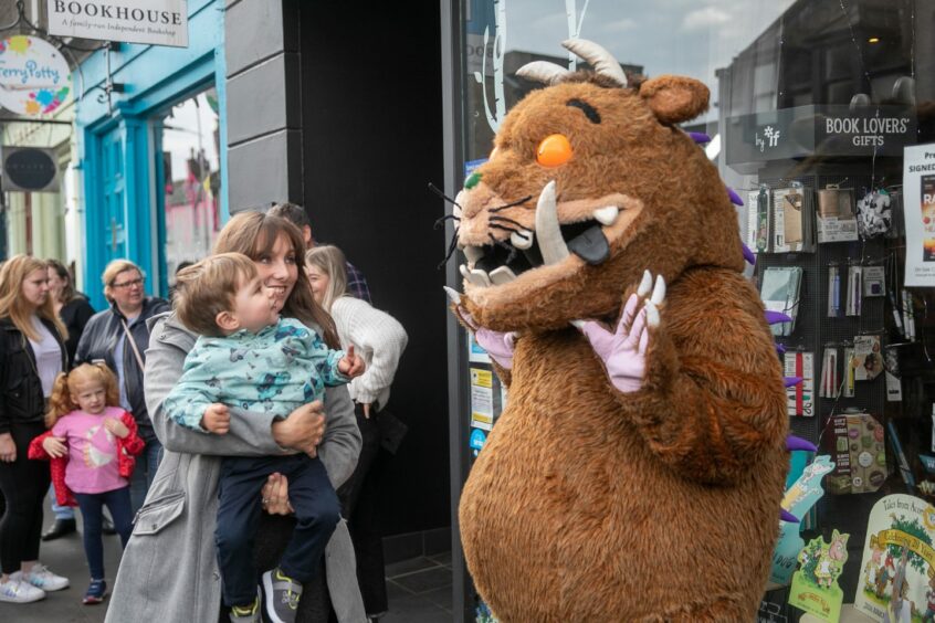 Calvin, 18 months, and his mum, Megan Hainey, with the Gruffalo.