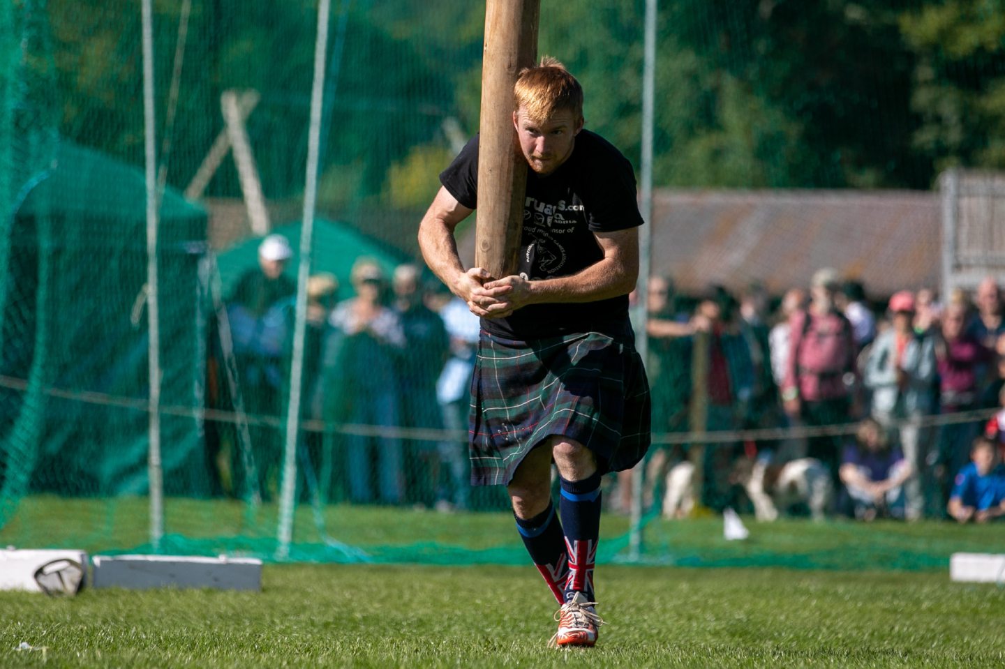 David Colthart Jr takes part in the caber toss event at Pitlochry Highland Games.