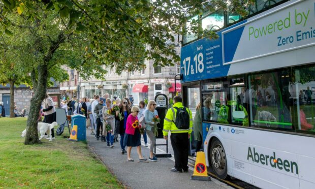 Mourners have been boarding buses at Balmoral through the day. Photo: Kath Flannery/DC Thomson