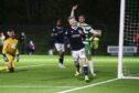 Lyall Cameron celebrates his goal in Dundee's 3-0 win over The New Saints.