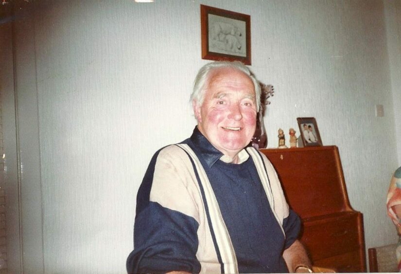 Photo shows Lindsay Bruce's grandfather George Gould, a grey-haired man with a big smile.