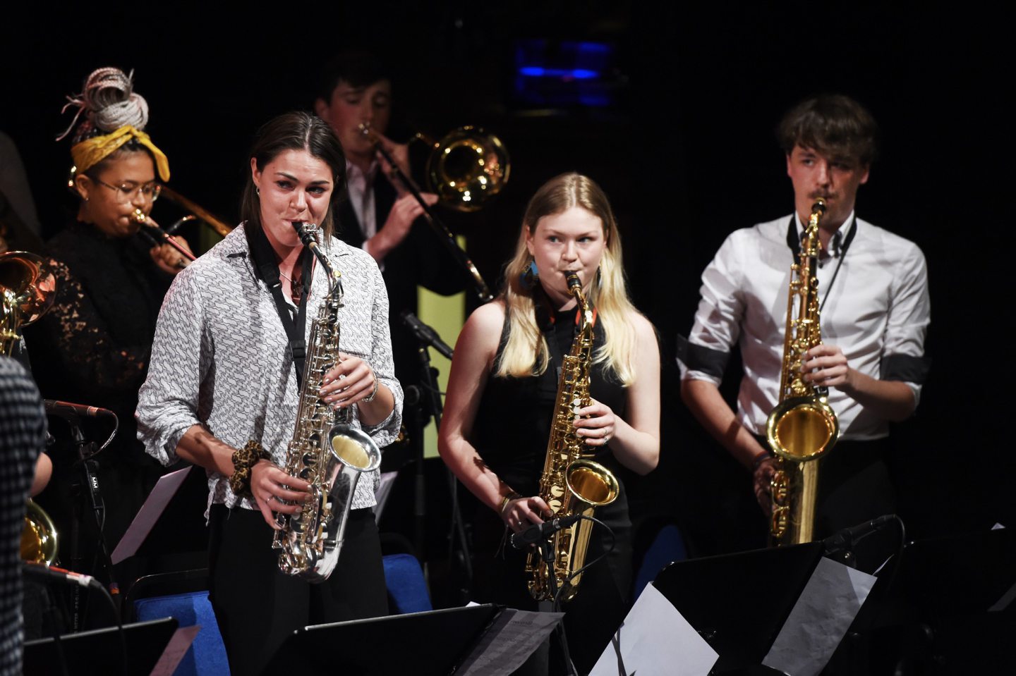 Students playing saxophone.