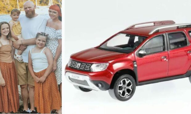 Sian Samson and her family, and a model of the Dacia Duster that was stolen.