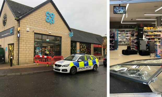 Police outside the Co-op at Panmurefield, where the front doors have been smashed in.
