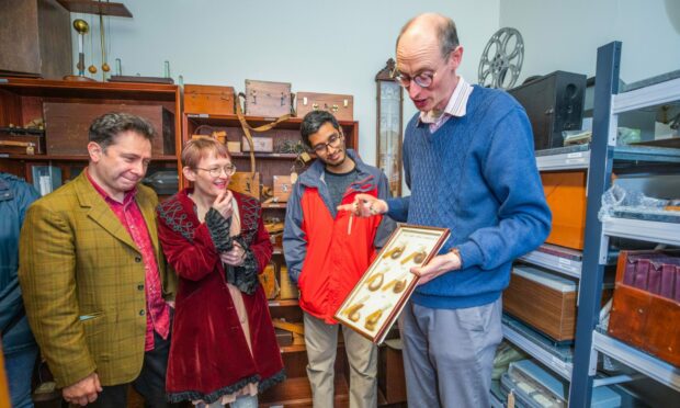 Curator Matthew Jarron guiding people around Hawkhill House's fascinating collection.