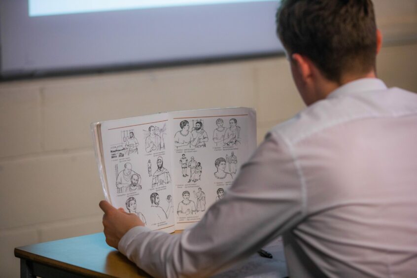 Picture shows scenes from the class at Monifieth High School. 