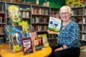 Fife librarian Pauline Smeaton with some of her top recommended books for children to read. Pic: Steve Brown / DCT Media.