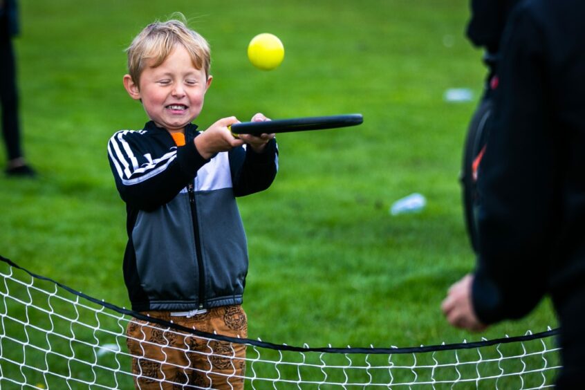 Joey Jamieson, 6, plays soft tennis.