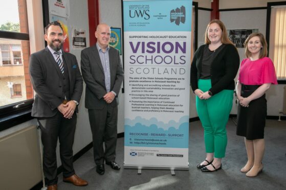 Kirkcaldy High School has been given an award from Vision Schools Scotland for its dedication to Holocaust education. From left: Andy Jones (PTC of Social Subjects KHS), Dr Andrew Killen (depute director of Vision Schools Scotland), History teachers Mollie Osborne and Alannah Dalziel. Steve Brown / DCT Media.