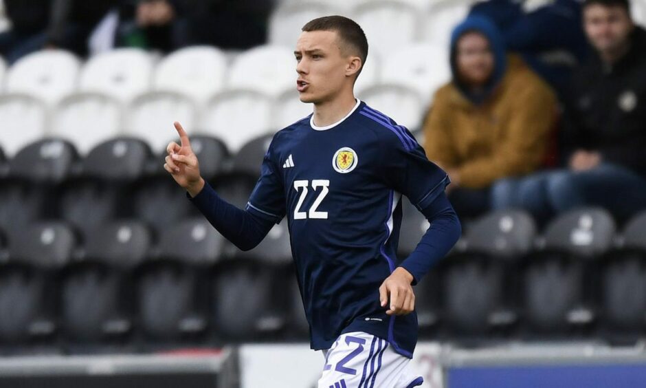 Archie Meekison in action for Scotland U21s.