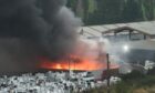 Firefighters tackle a recycling centre blaze in Perth.