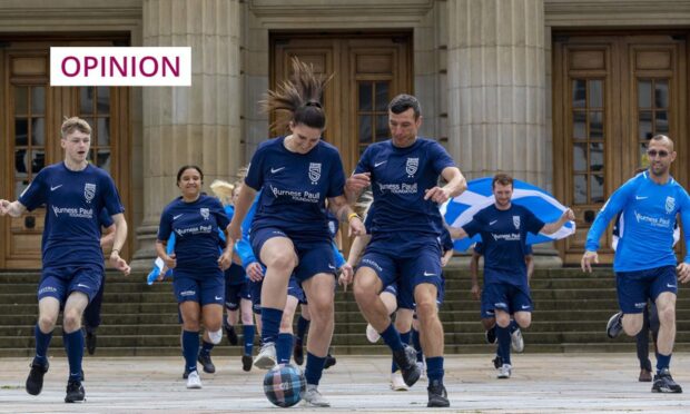 Dundee's Caird Hall was the backdrop for a photo shoot ahead of the Street Soccer Scotland Nations Cup event. Jeff Holmes JSHPIX/Shutterstock.