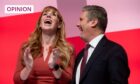 photo shows Labour leader Keir Starmer and deputy leader Angela Rayner smiling broadly on stage at the Labour Party conference in Liverpool.