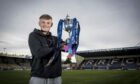 Raith Rovers' Kyle Connell with the SPFL Trust Trophy.