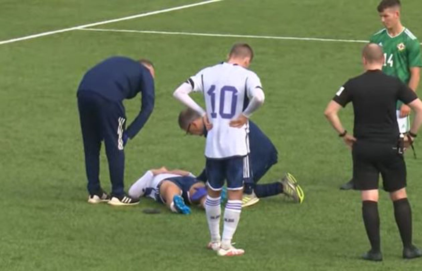 Adam Montgomery receives treatment for a late injury